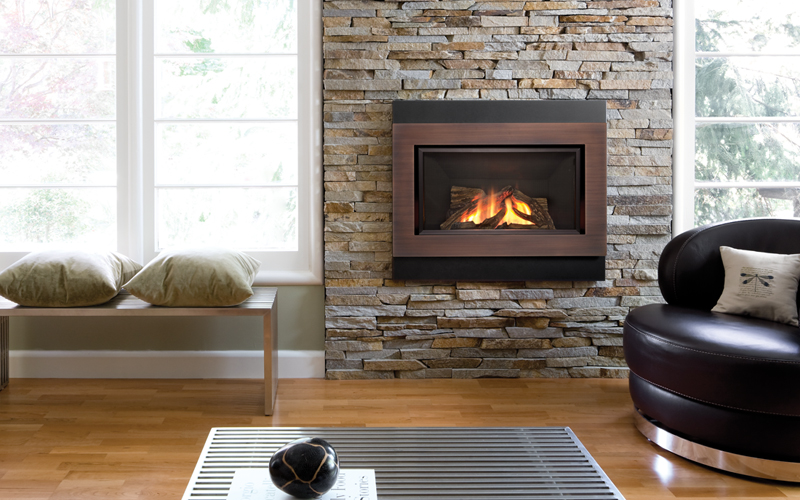 image shows man and woman sat infront of their gas fire